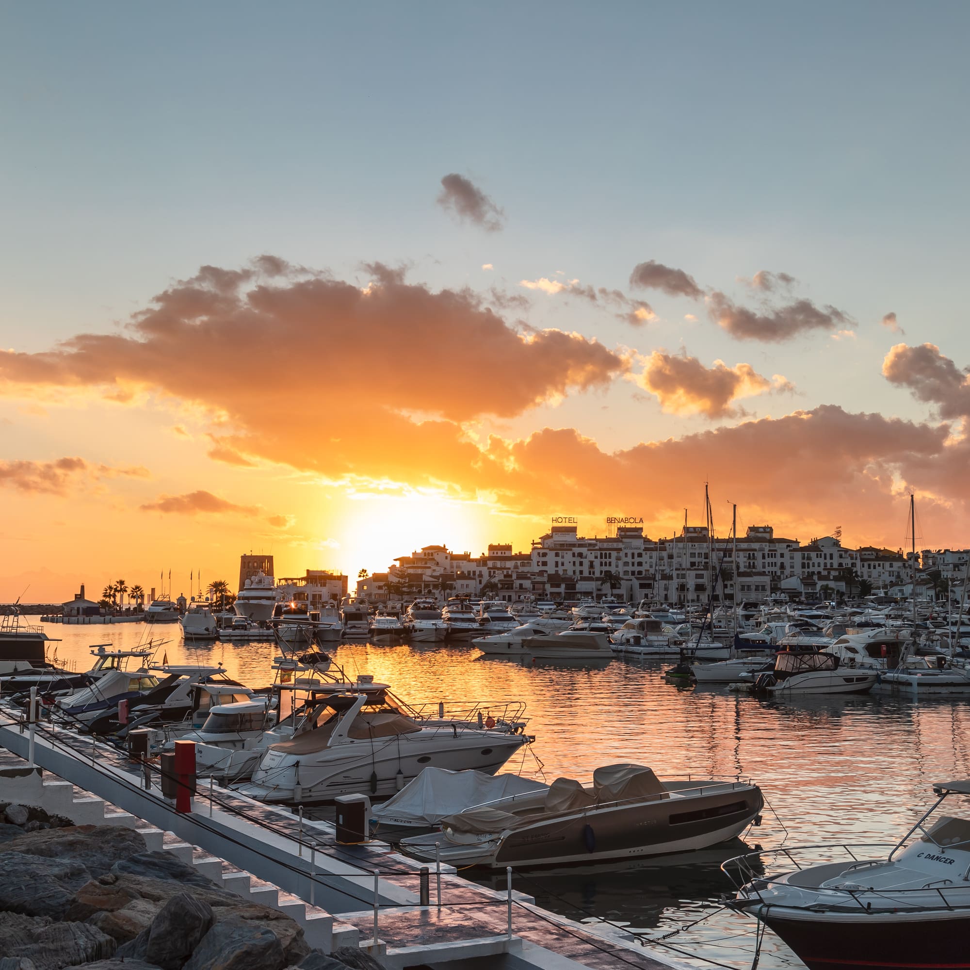a group of boats in a harbor