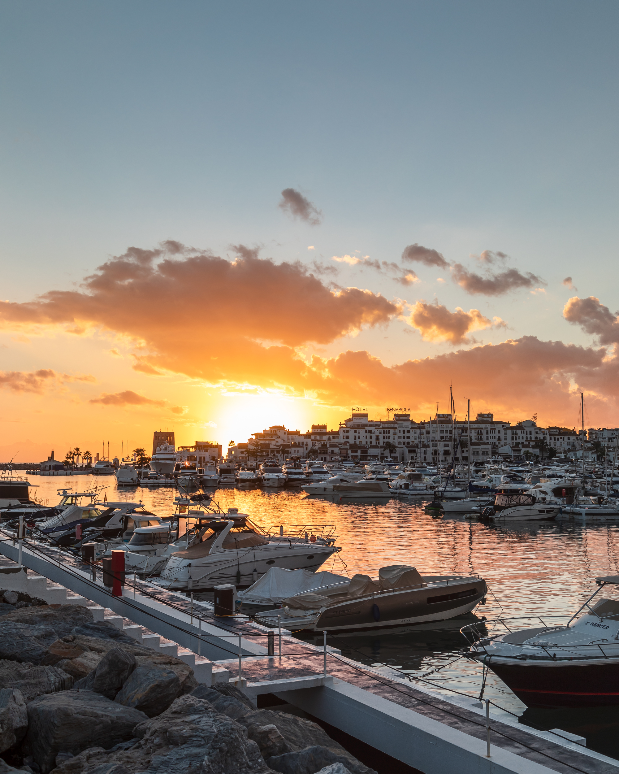 a group of boats in a harbor