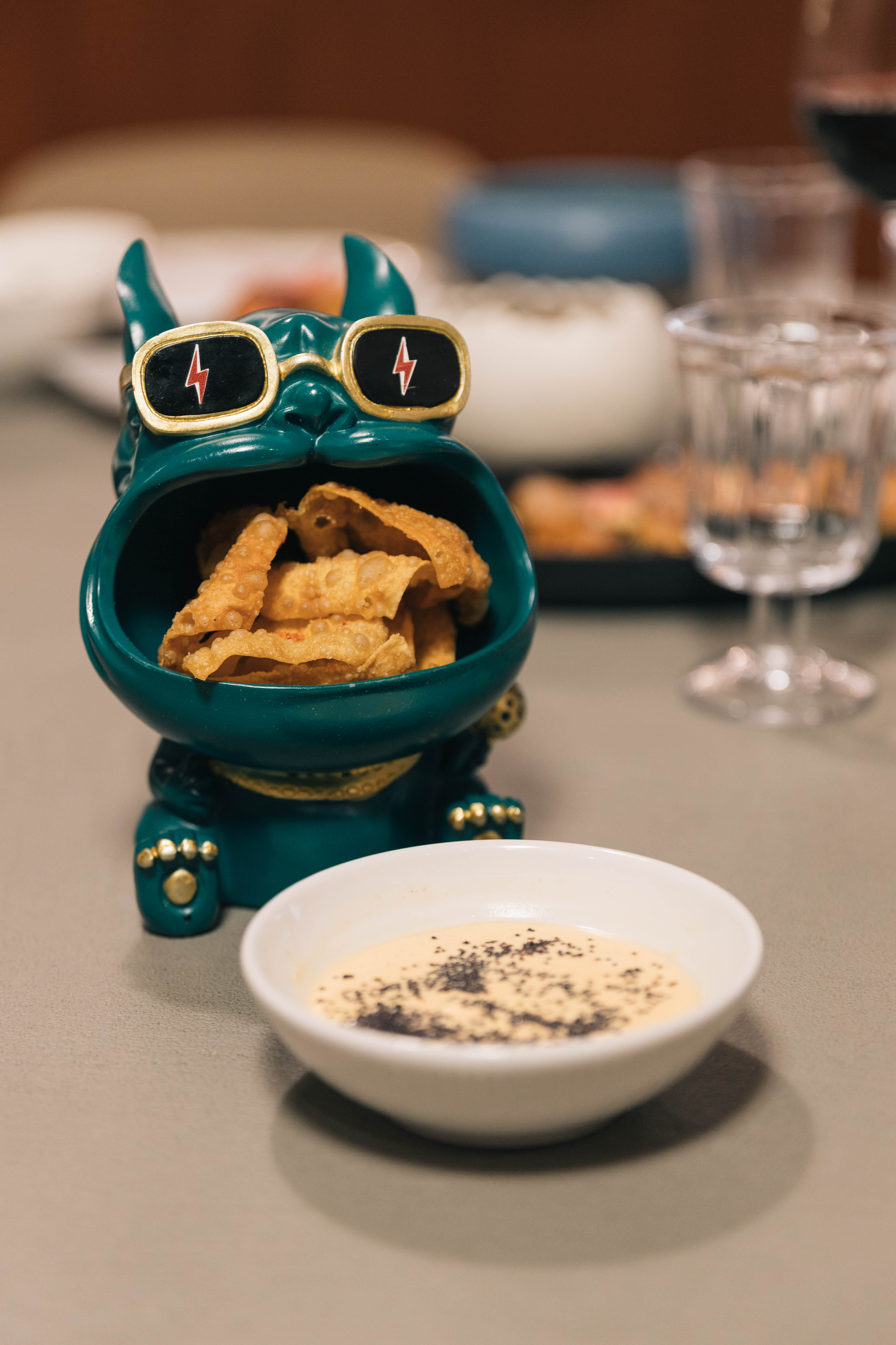 a bowl of food next to a bowl of food