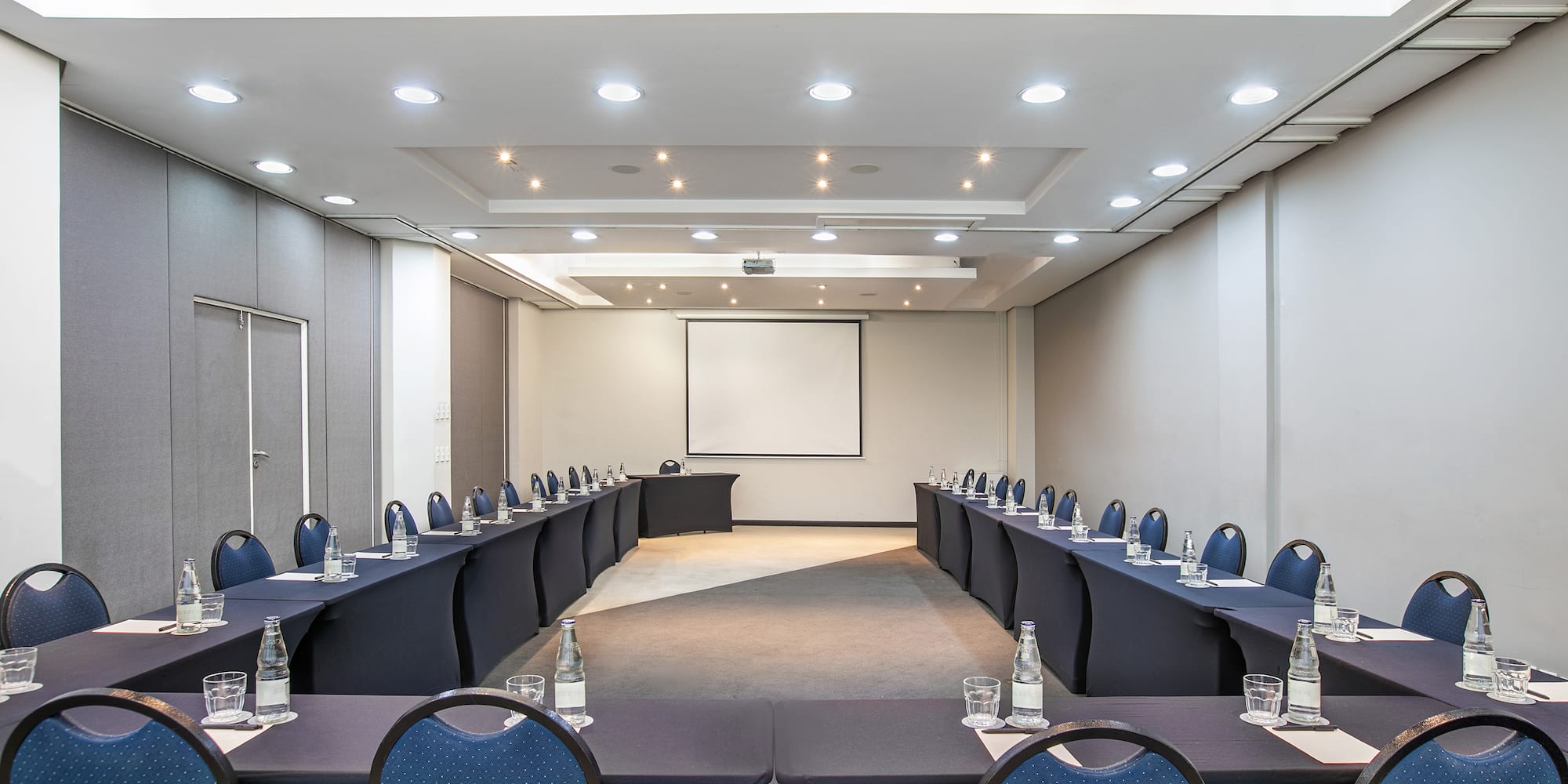 a room with tables and chairs