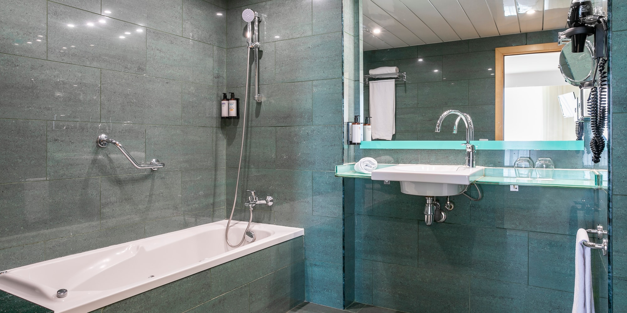 a bathroom with a sink and bathtub