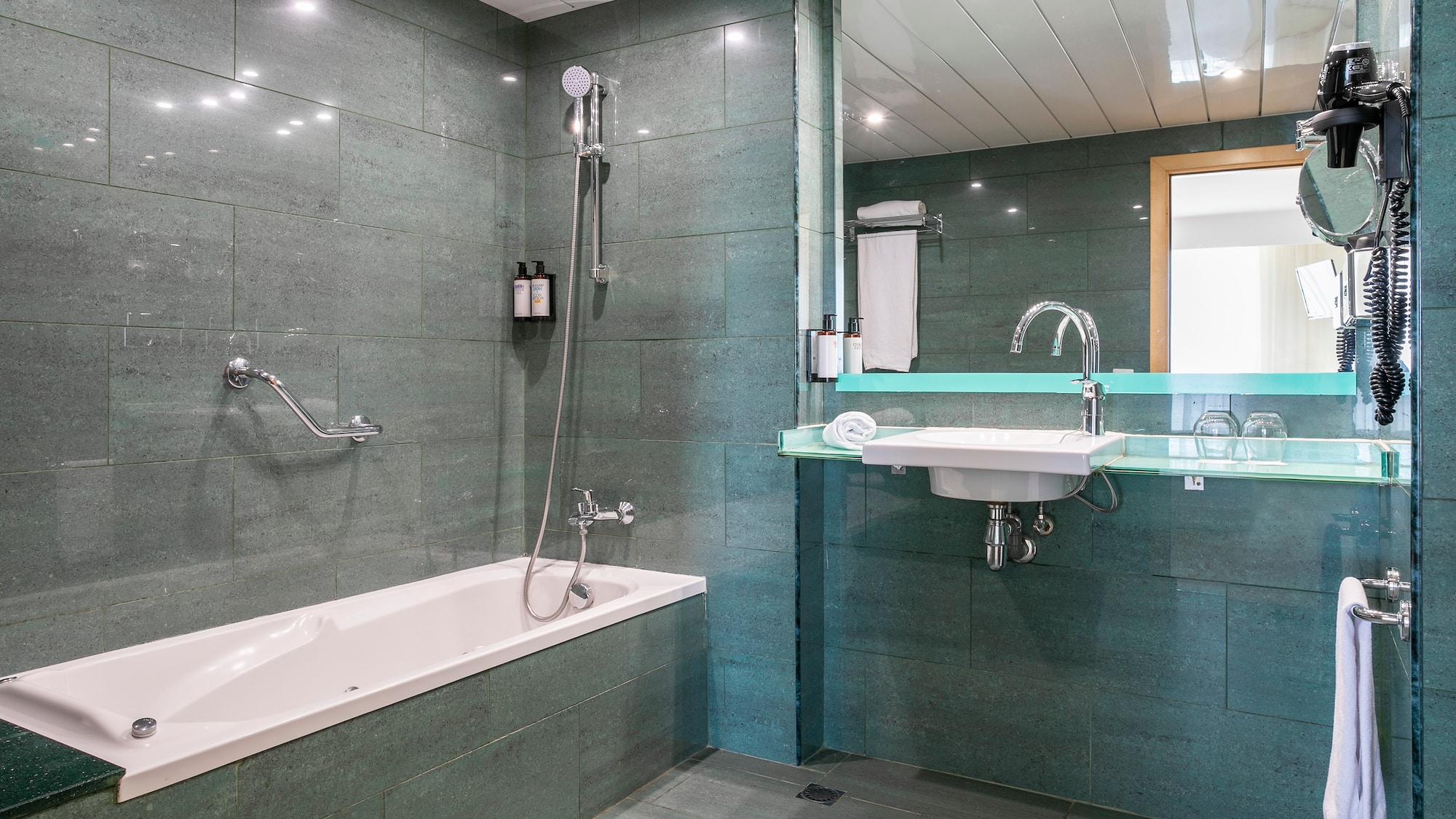 a bathroom with a sink and bathtub