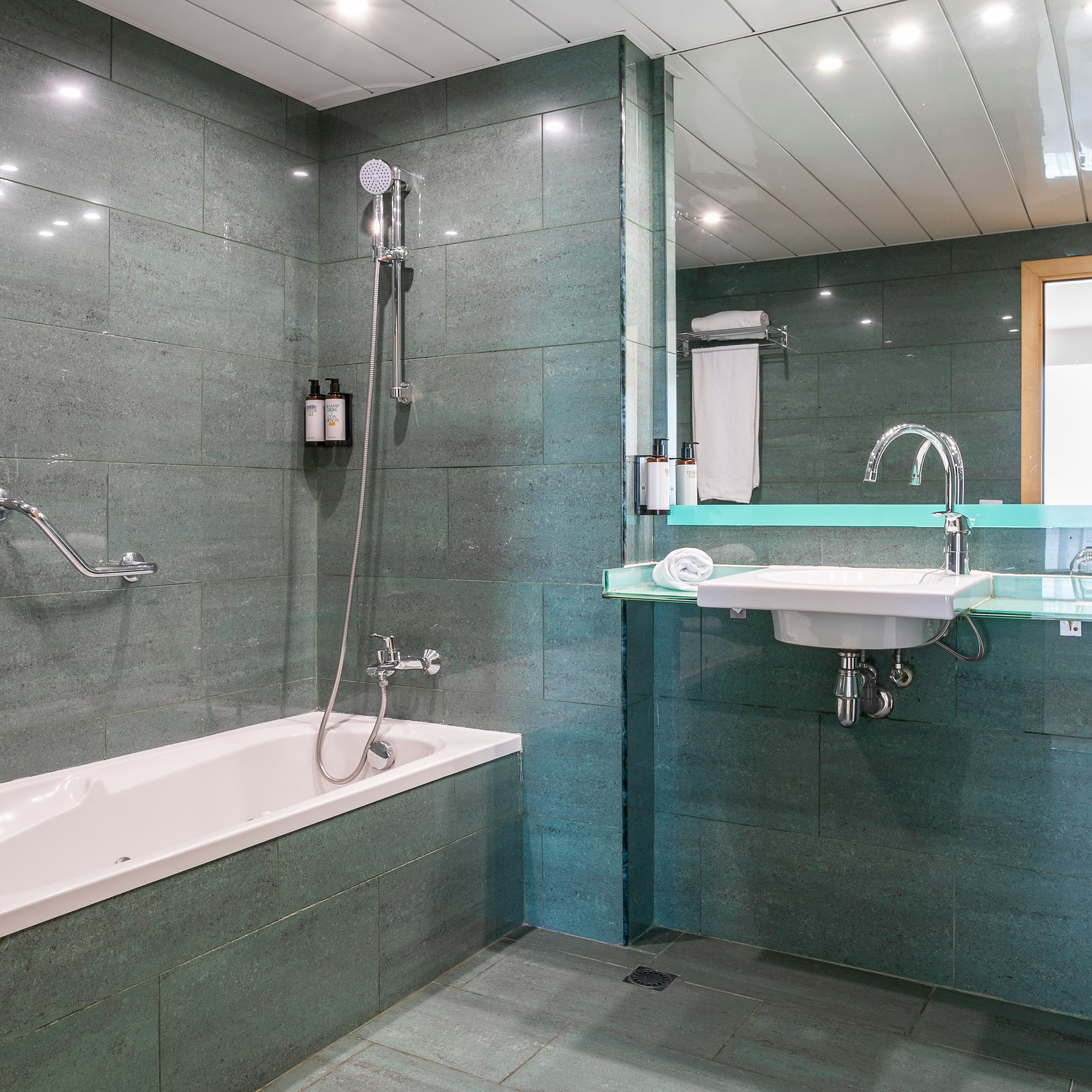 a bathroom with a sink and bathtub