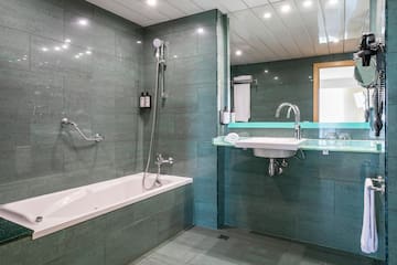 a bathroom with a sink and bathtub