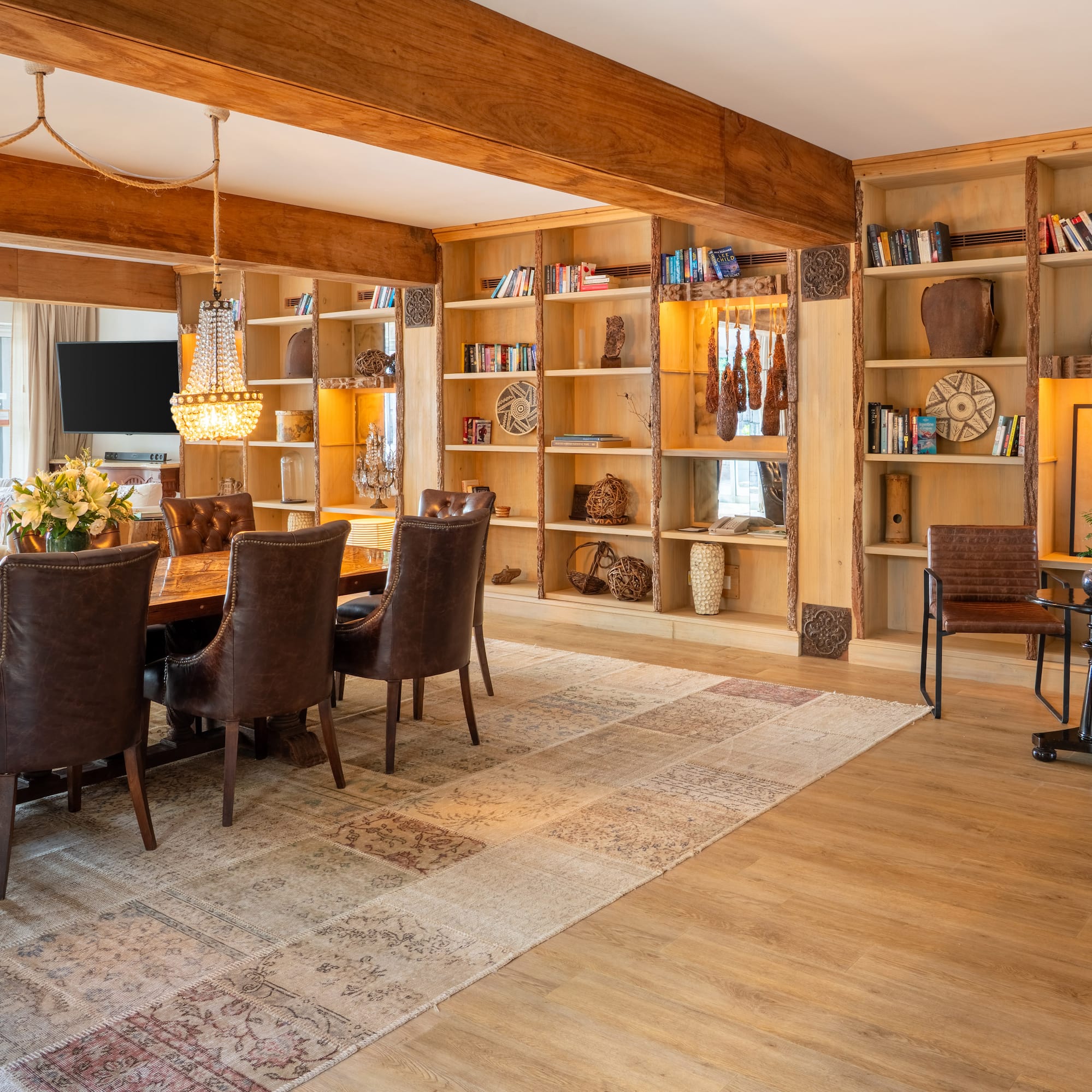 a room with a table and chairs