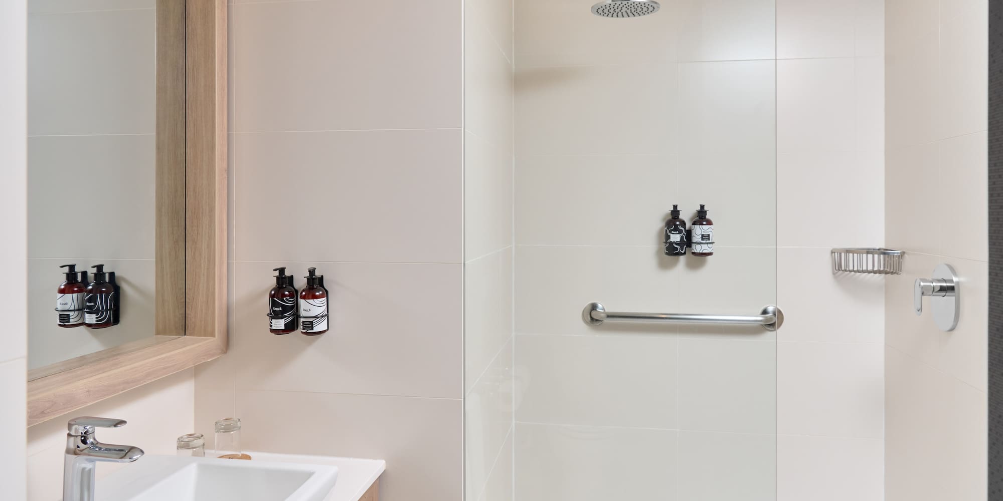 a bathroom with a shower and sink