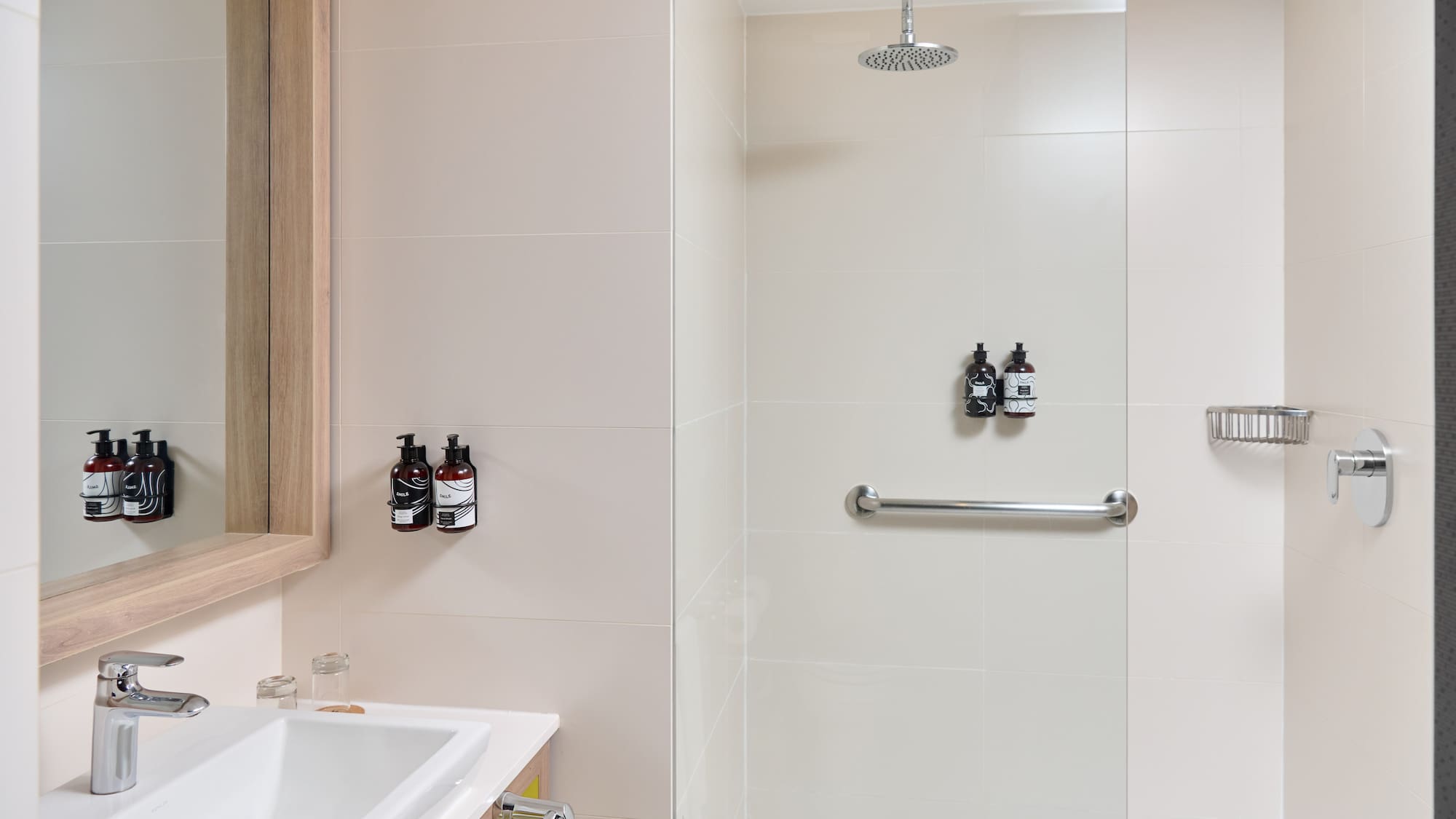 a bathroom with a shower and sink