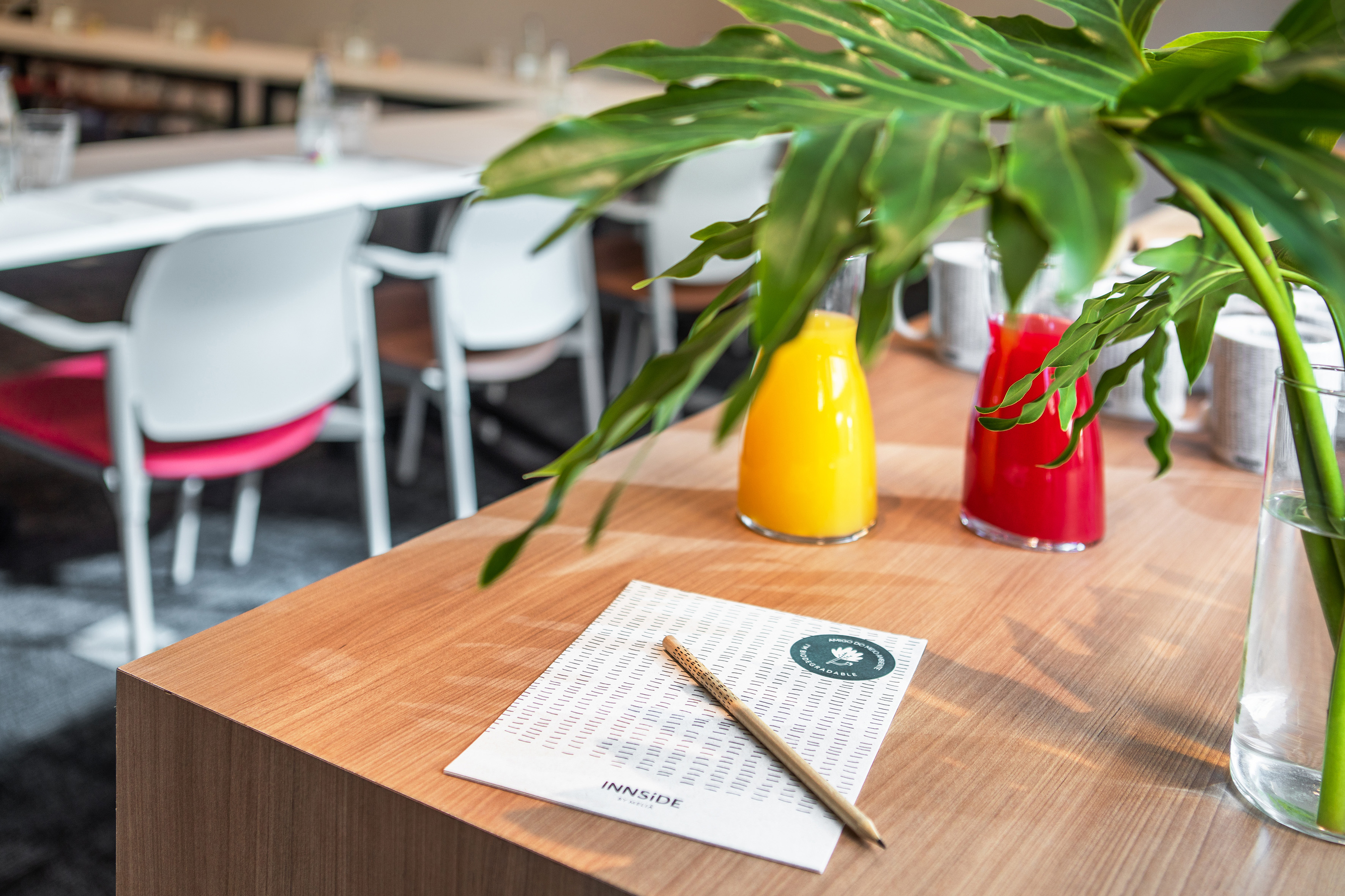 a table with a pen and a paper on it
