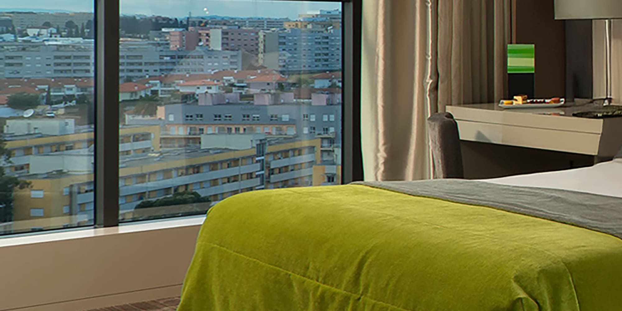 a bedroom with a large window