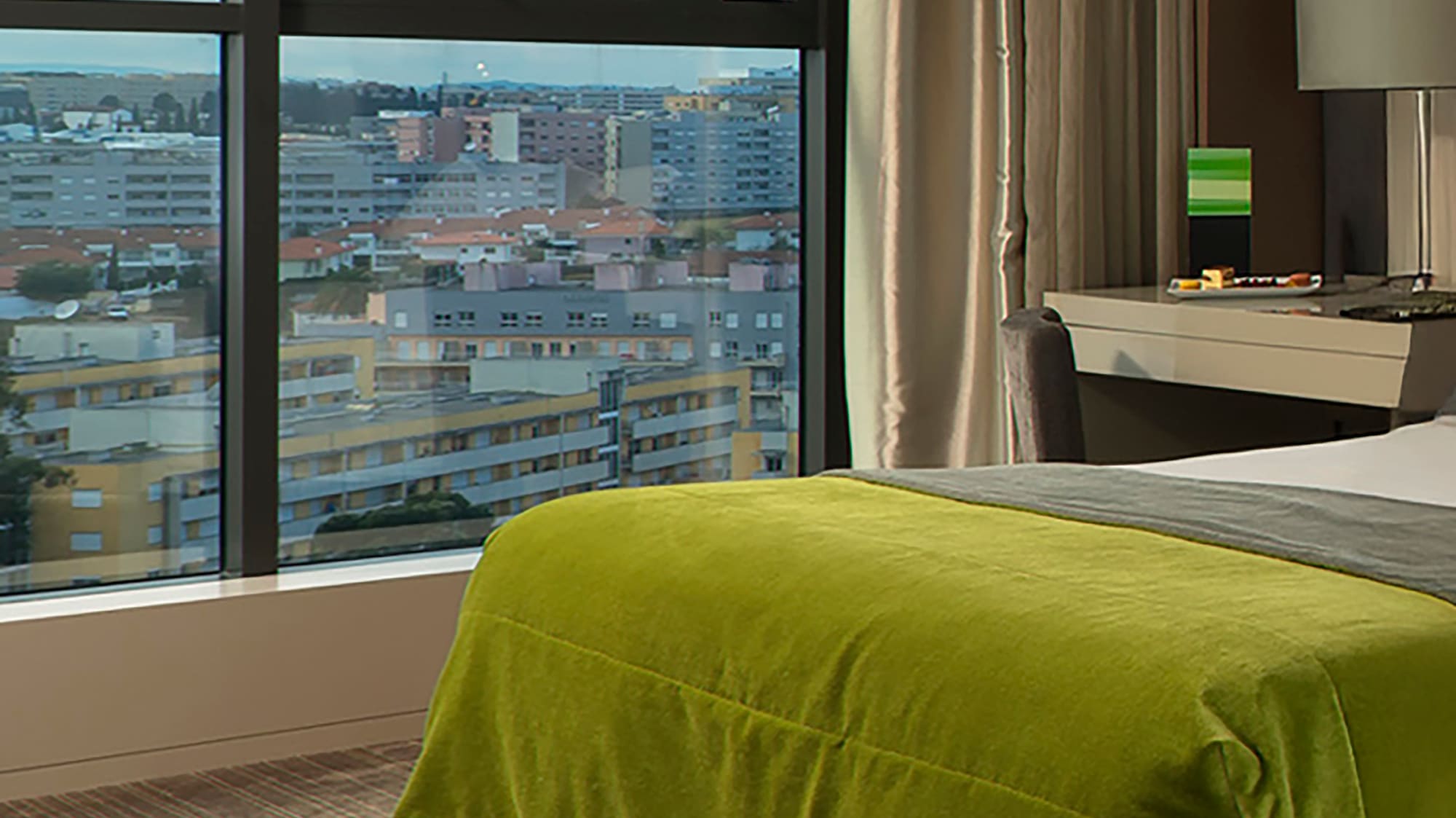 a bedroom with a large window