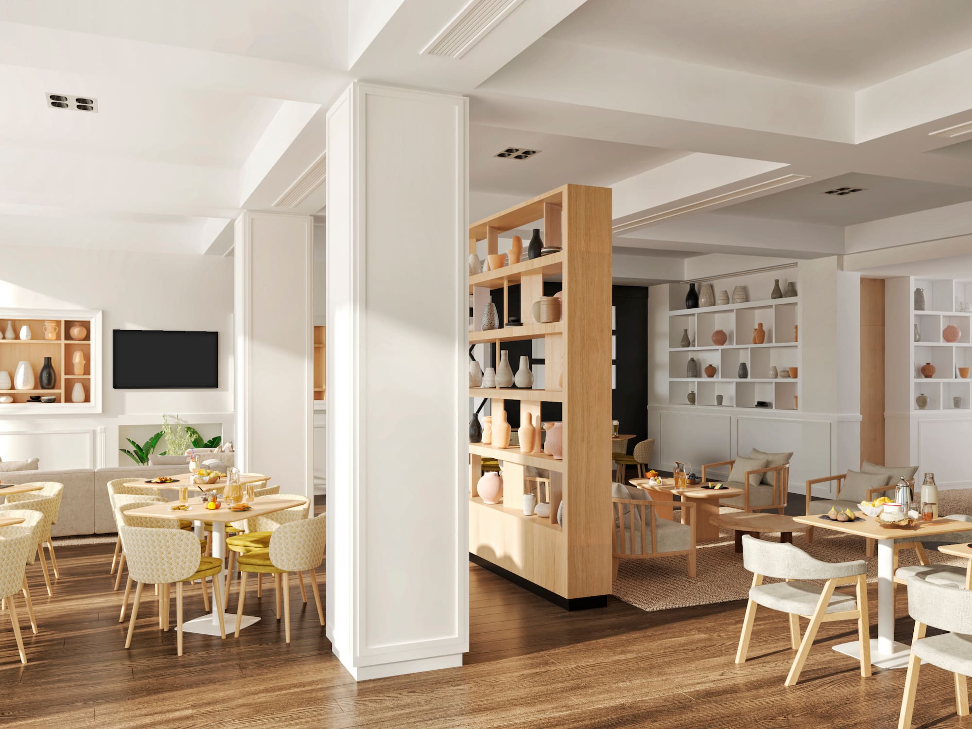 a room with a large white column and tables and chairs