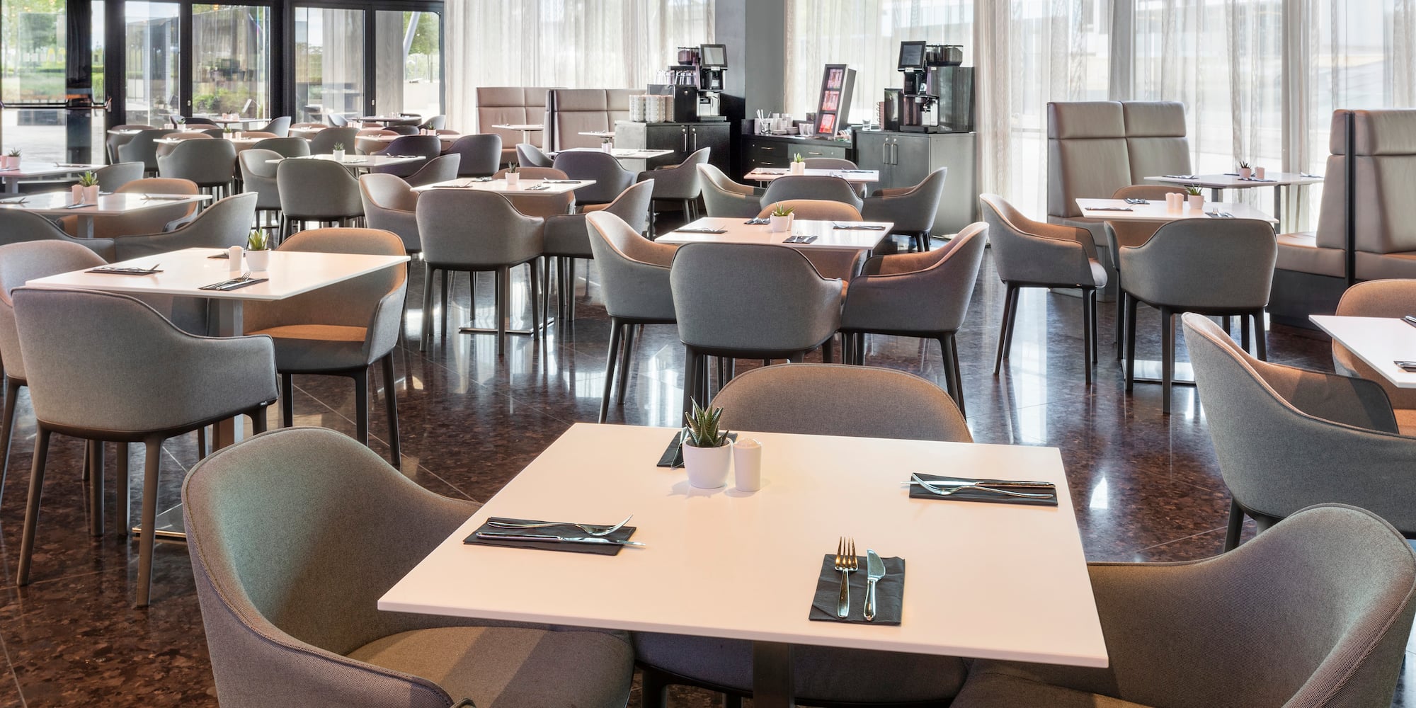 a room with tables and chairs