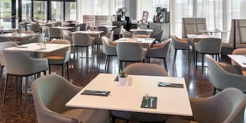 a room with tables and chairs