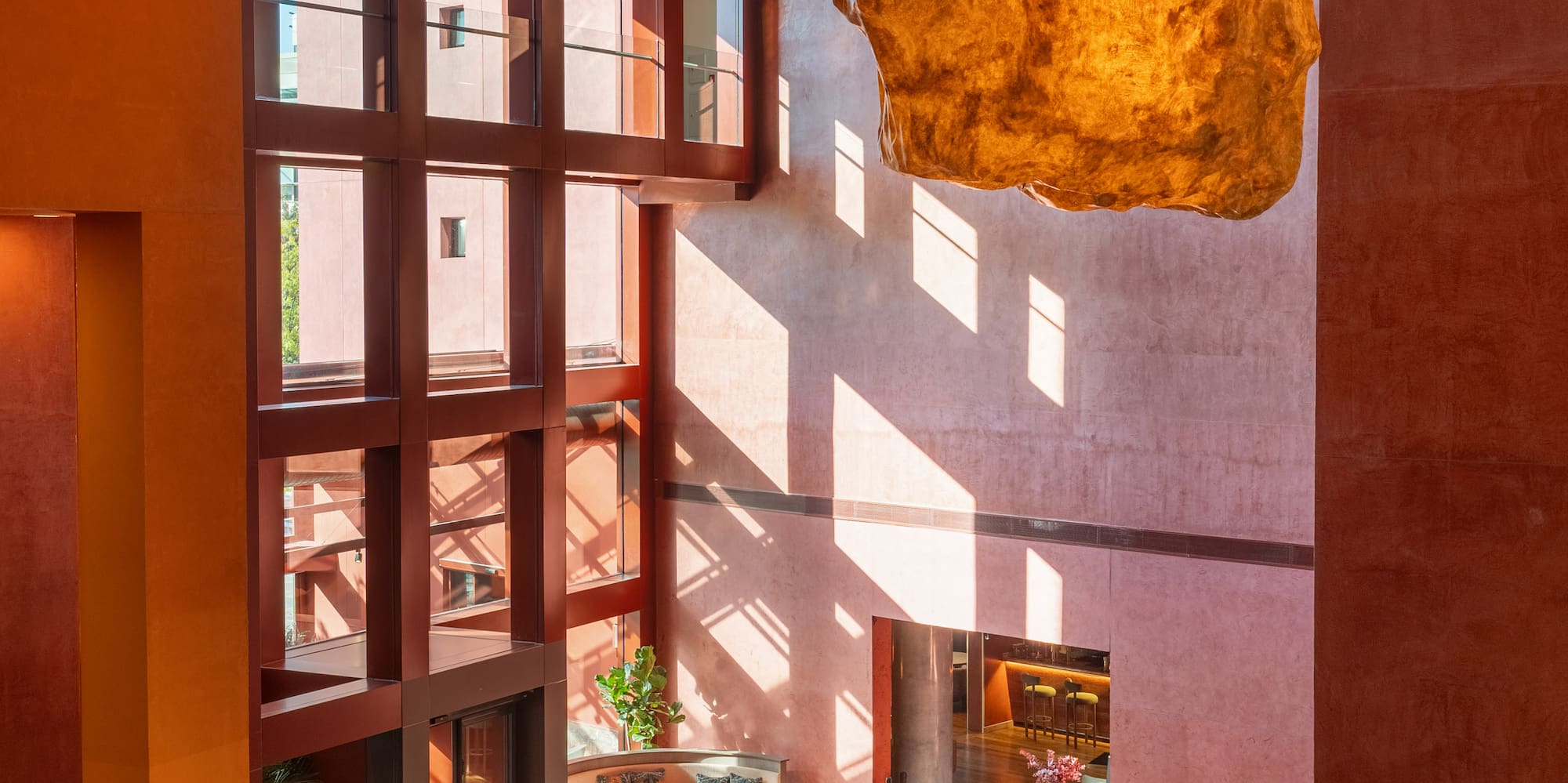 a large stone from the ceiling of a building