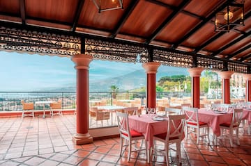 a restaurant with tables and chairs