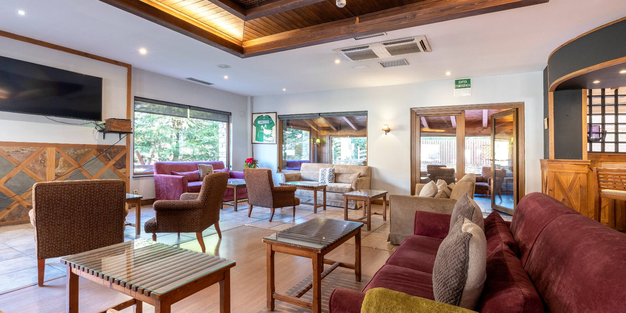 a room with couches and tables