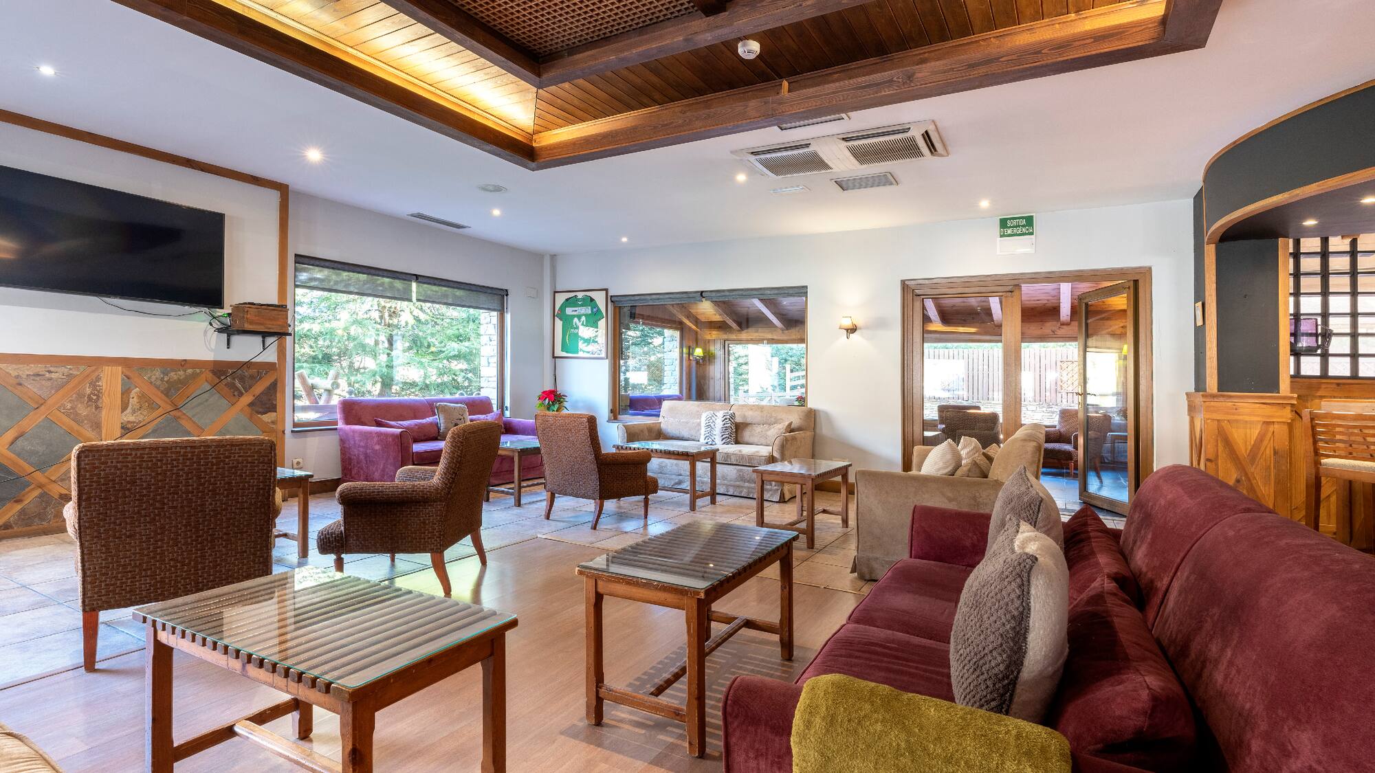 a room with couches and tables