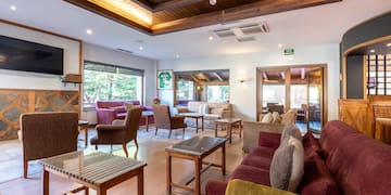 a room with couches and tables