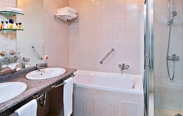 a bathroom with a sink and bathtub