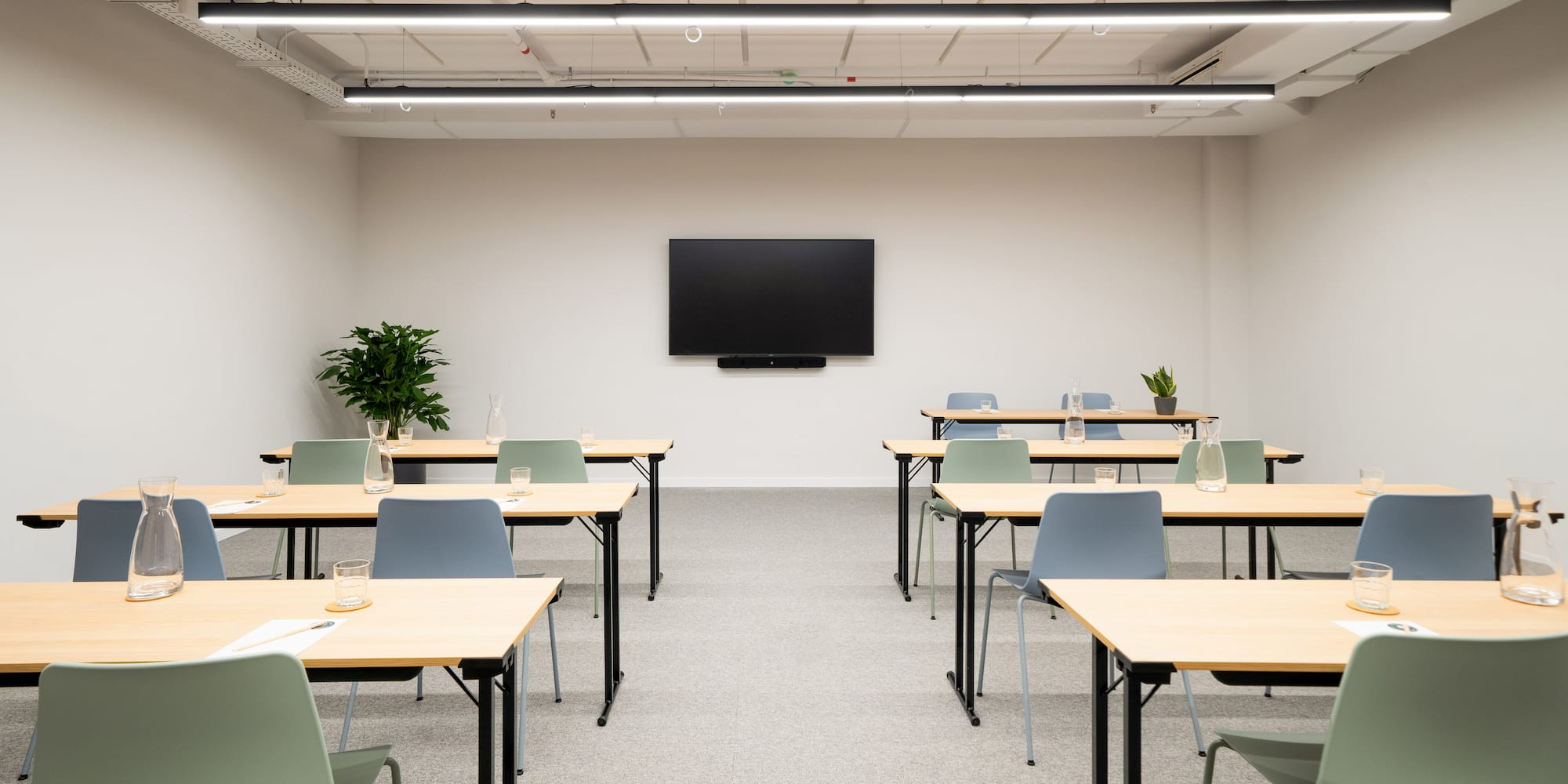 a room with tables and chairs