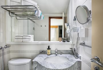 a bathroom with a sink and mirror