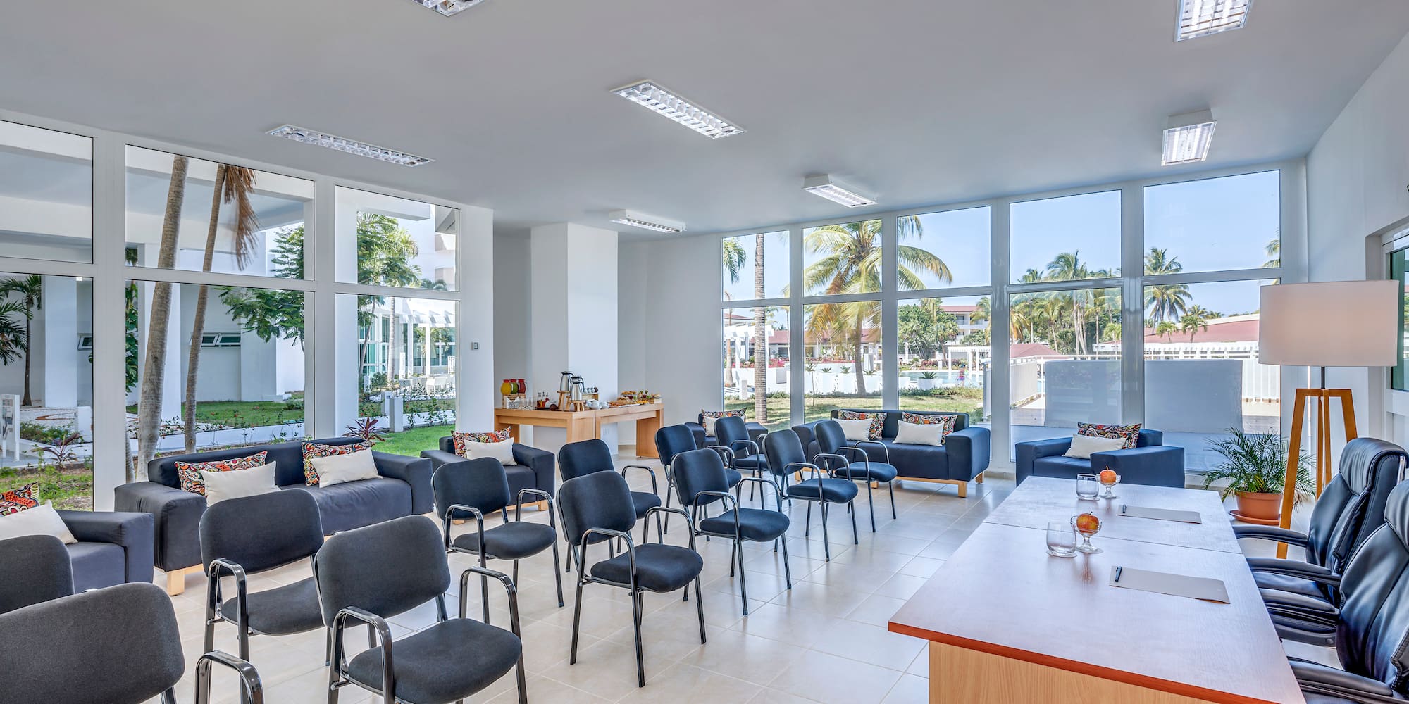 a room with chairs and tables