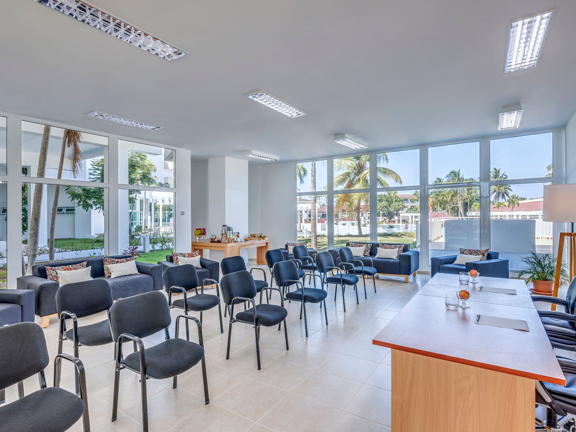 a room with chairs and tables