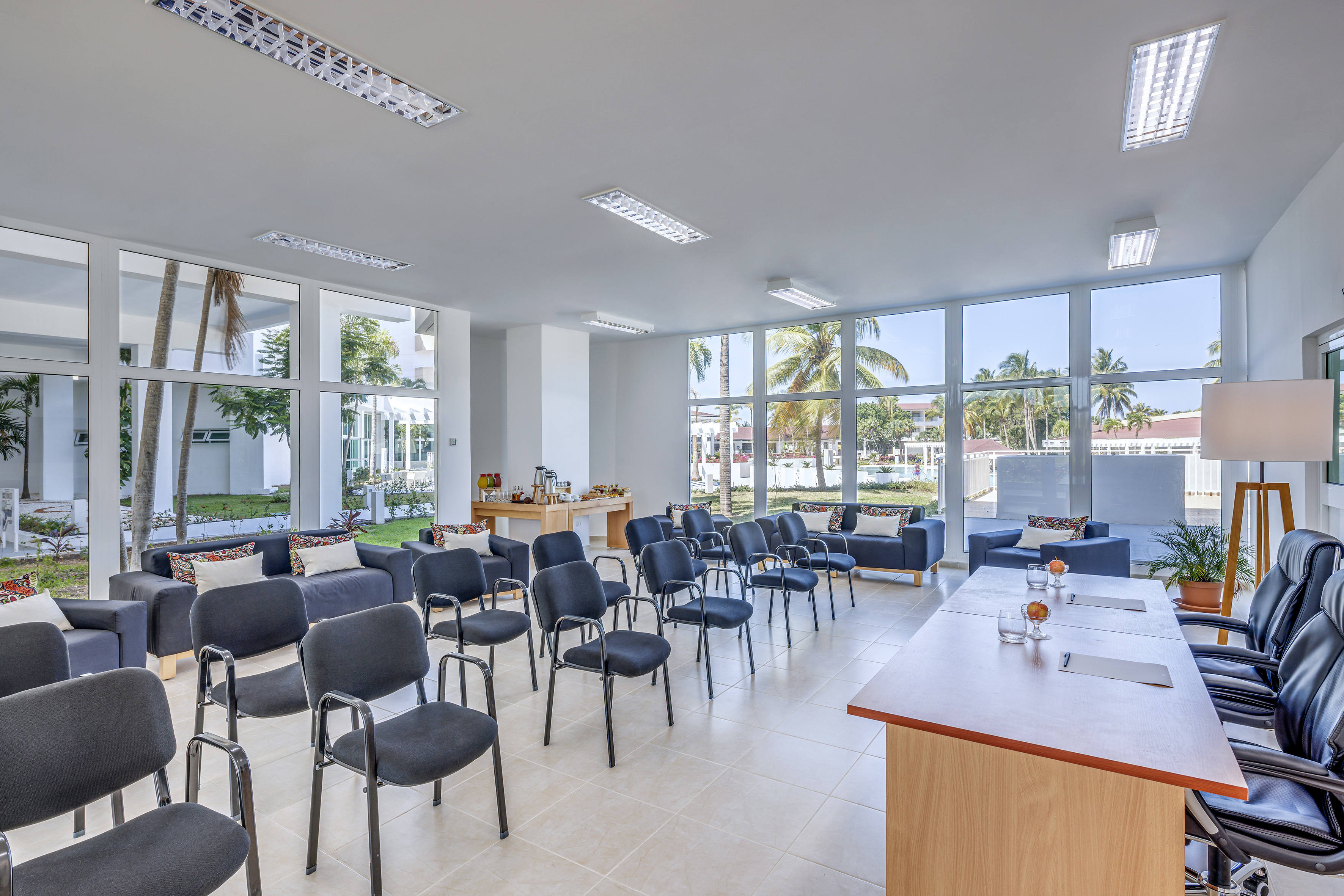 a room with chairs and tables