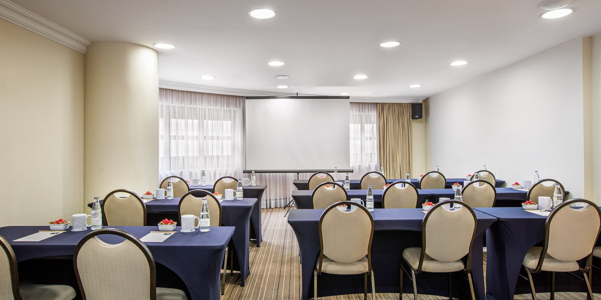 a room with tables and chairs