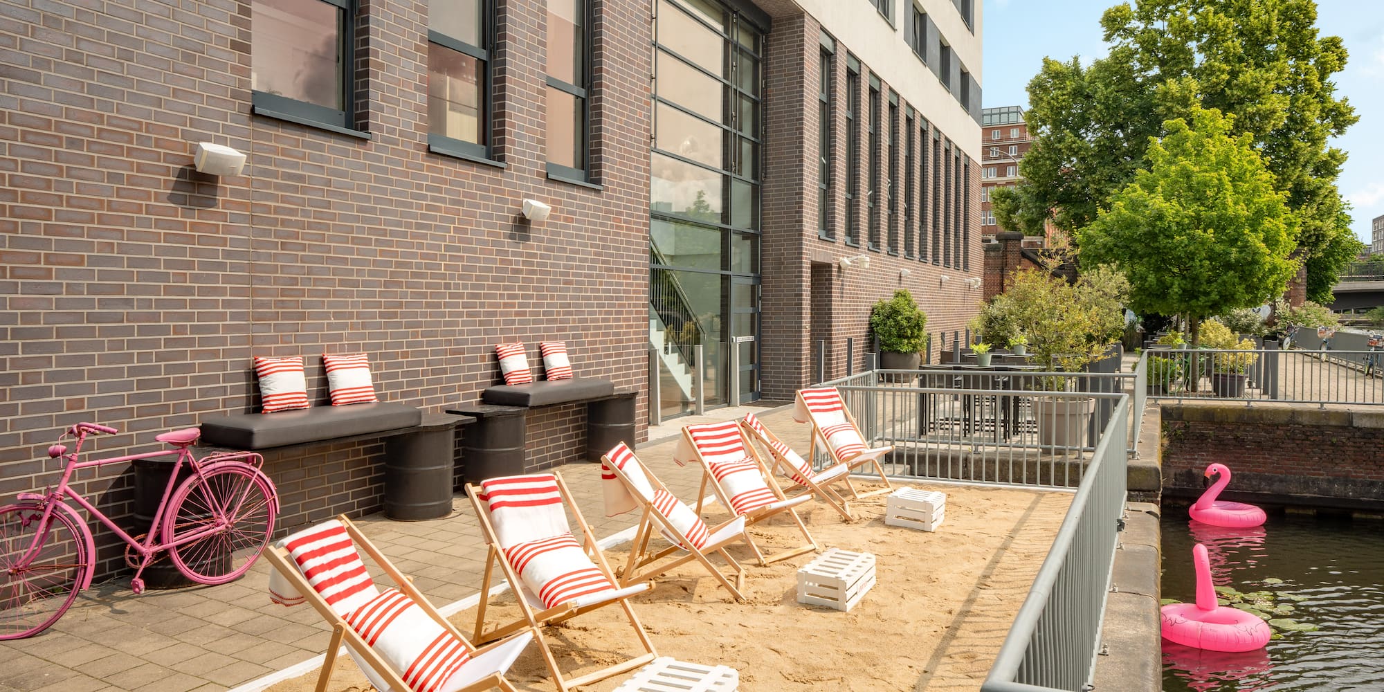 a group of chairs in sand