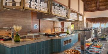 a restaurant with a buffet and food