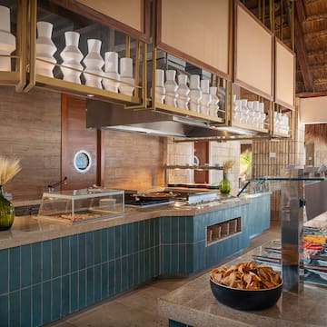 a restaurant with a buffet and food