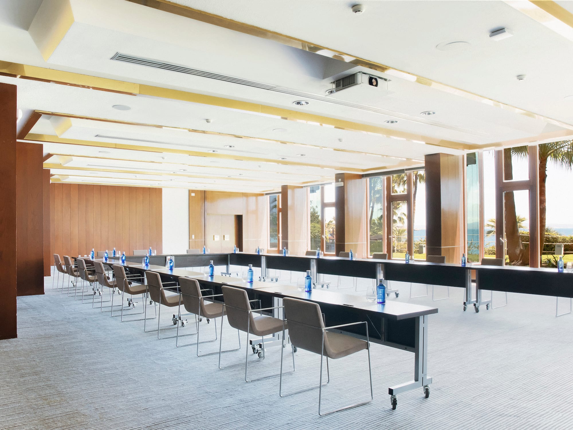 a room with tables and chairs.