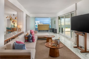 a living room with a couch and a television