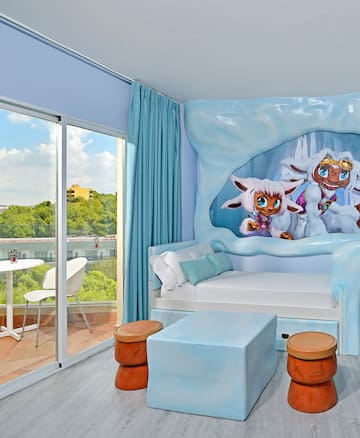 a room with a bed and a window