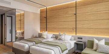 a room with a wood wall and a glass door