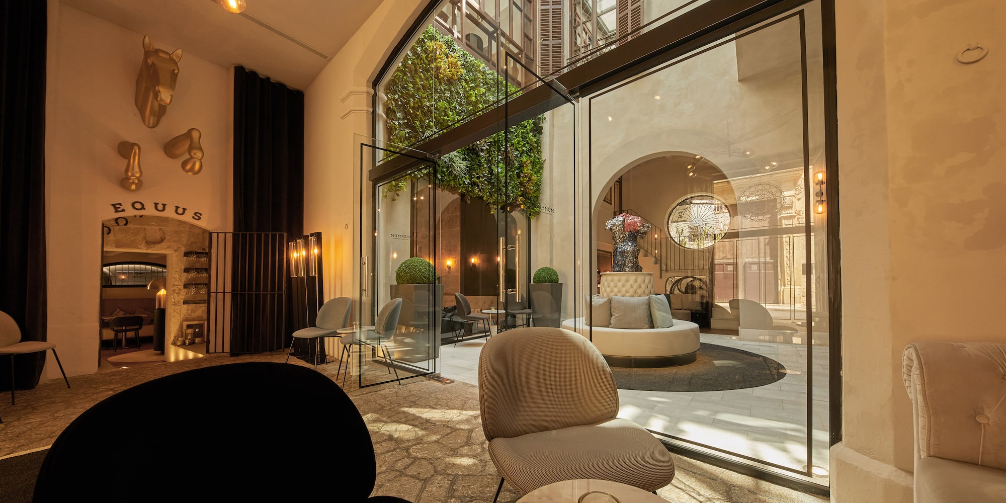 a room with glass walls and a large window