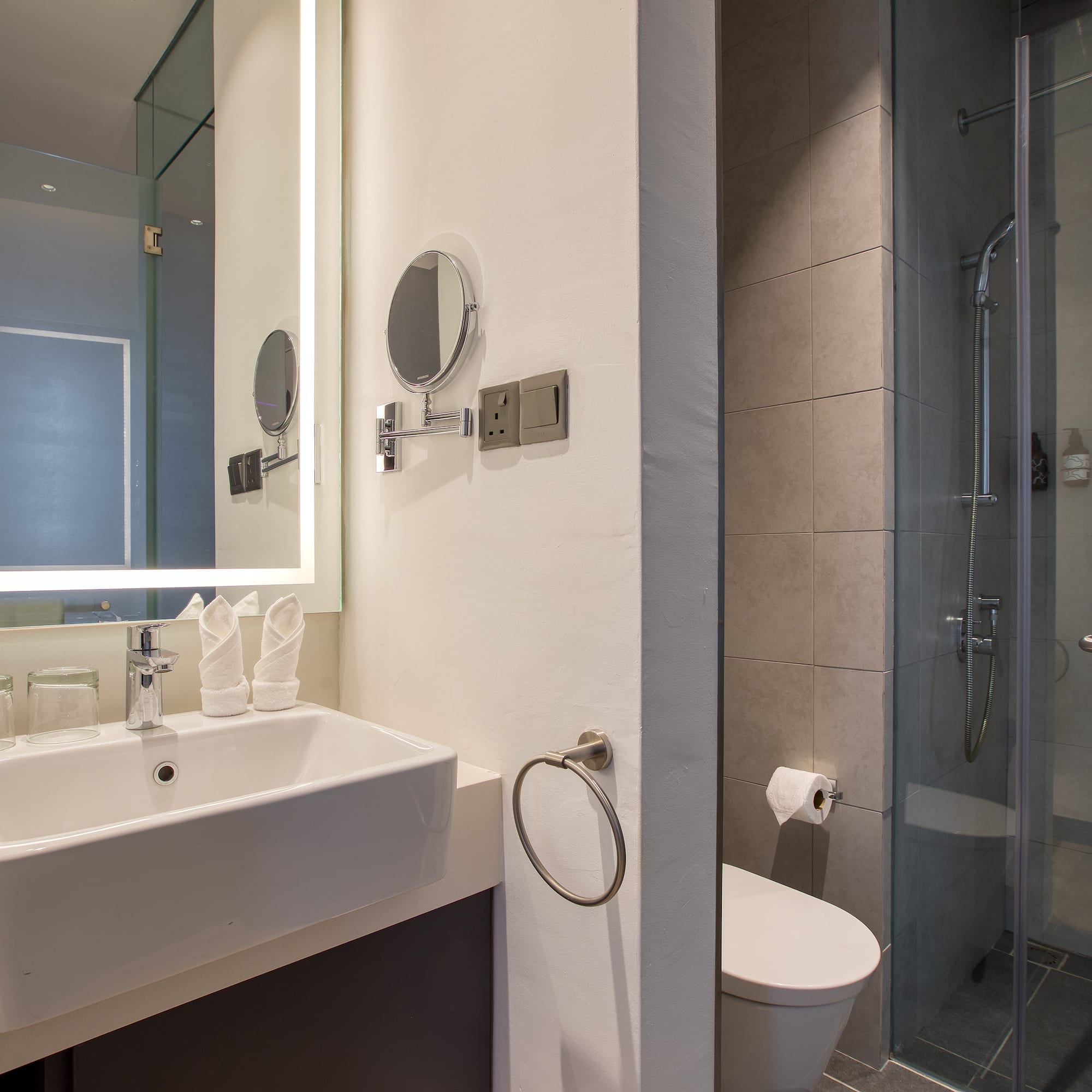 a bathroom with a mirror and sink