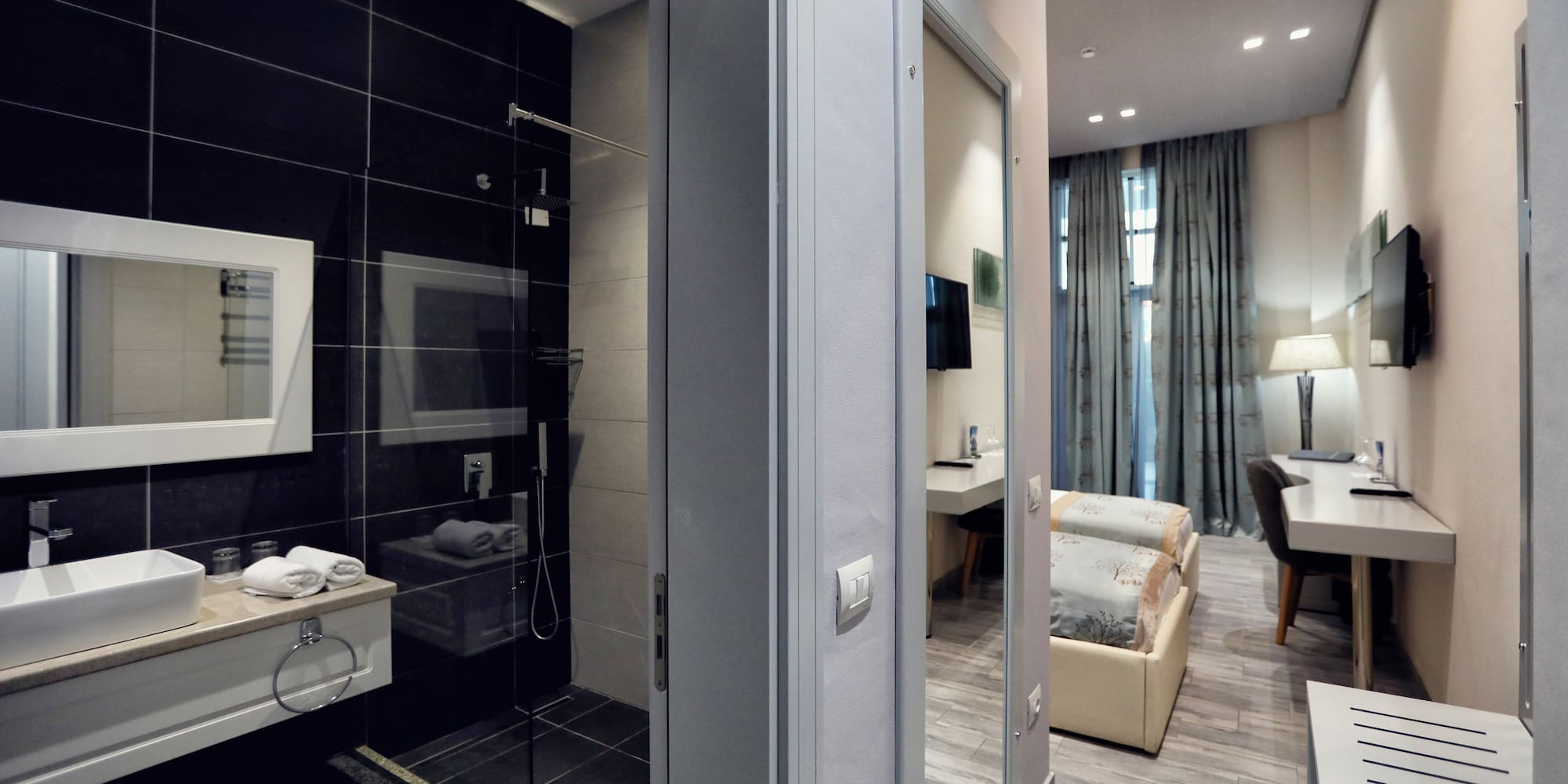 a bathroom with a shower and a bed