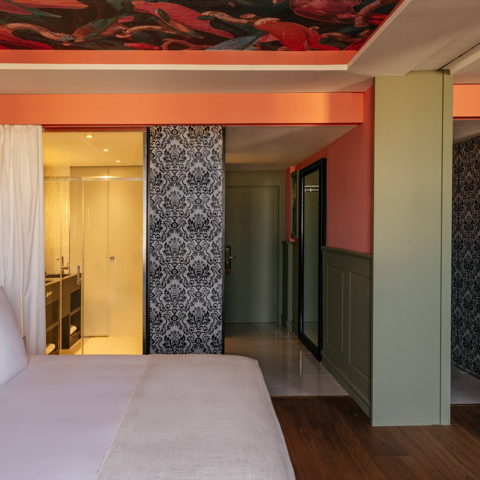 a room with a bed and a shower