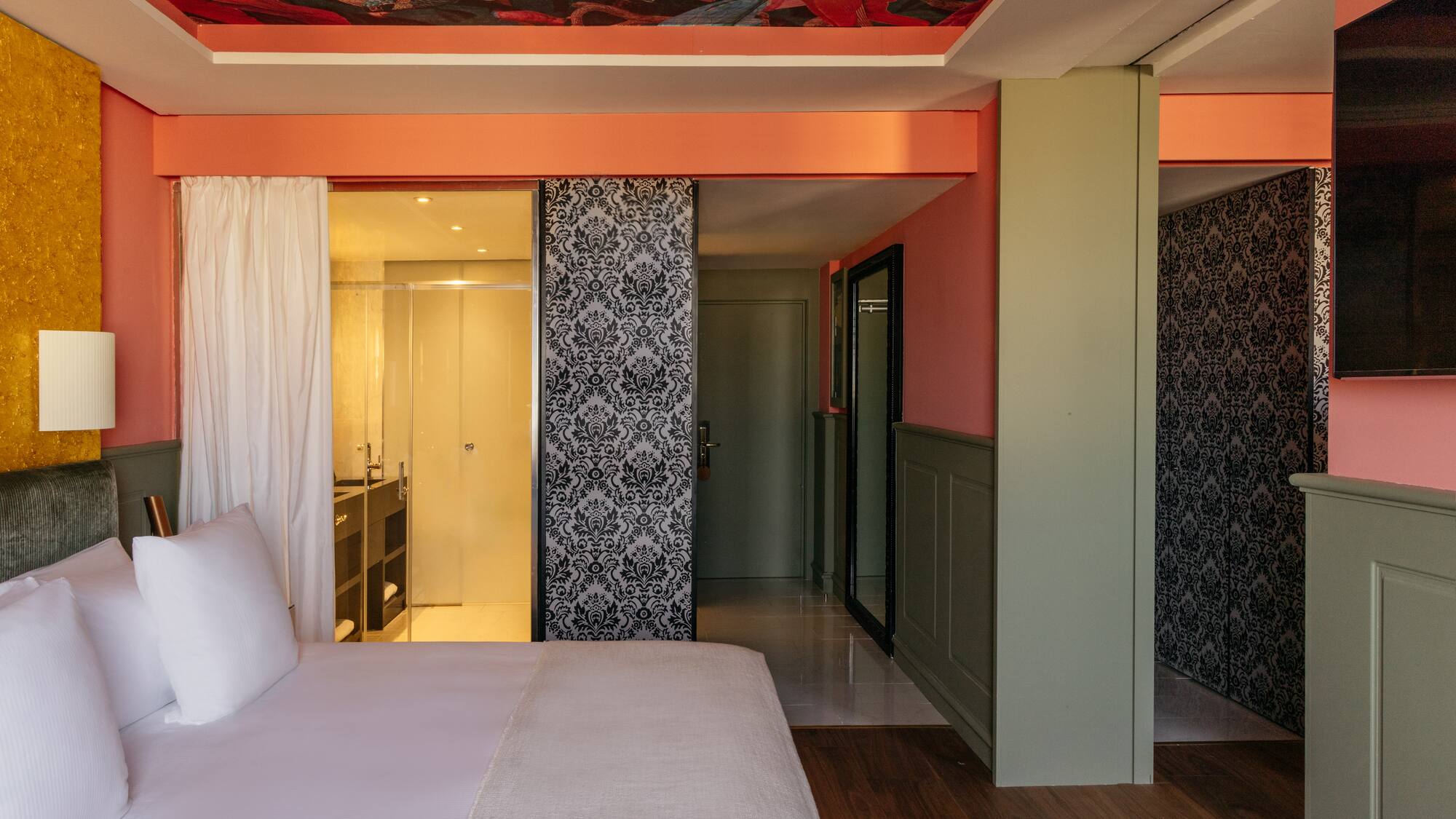 a room with a bed and a shower