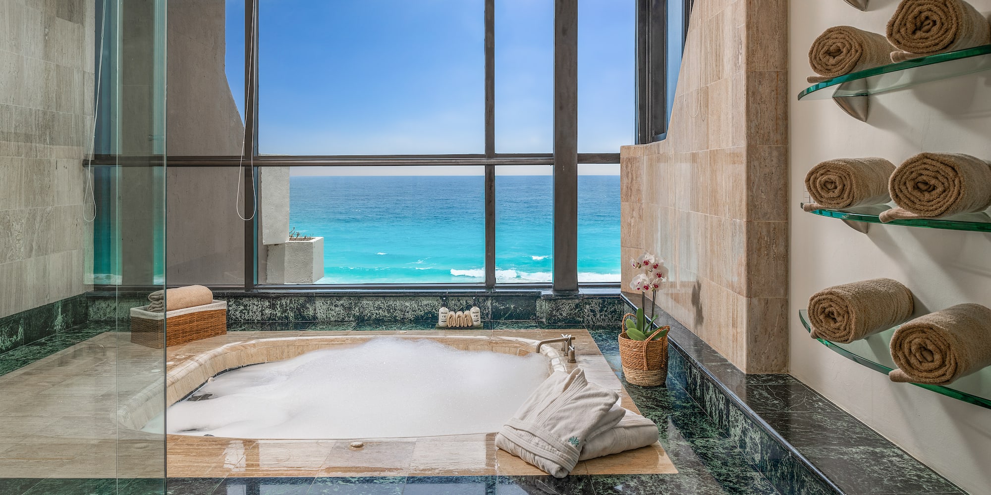 a large jacuzzi with a view of the ocean