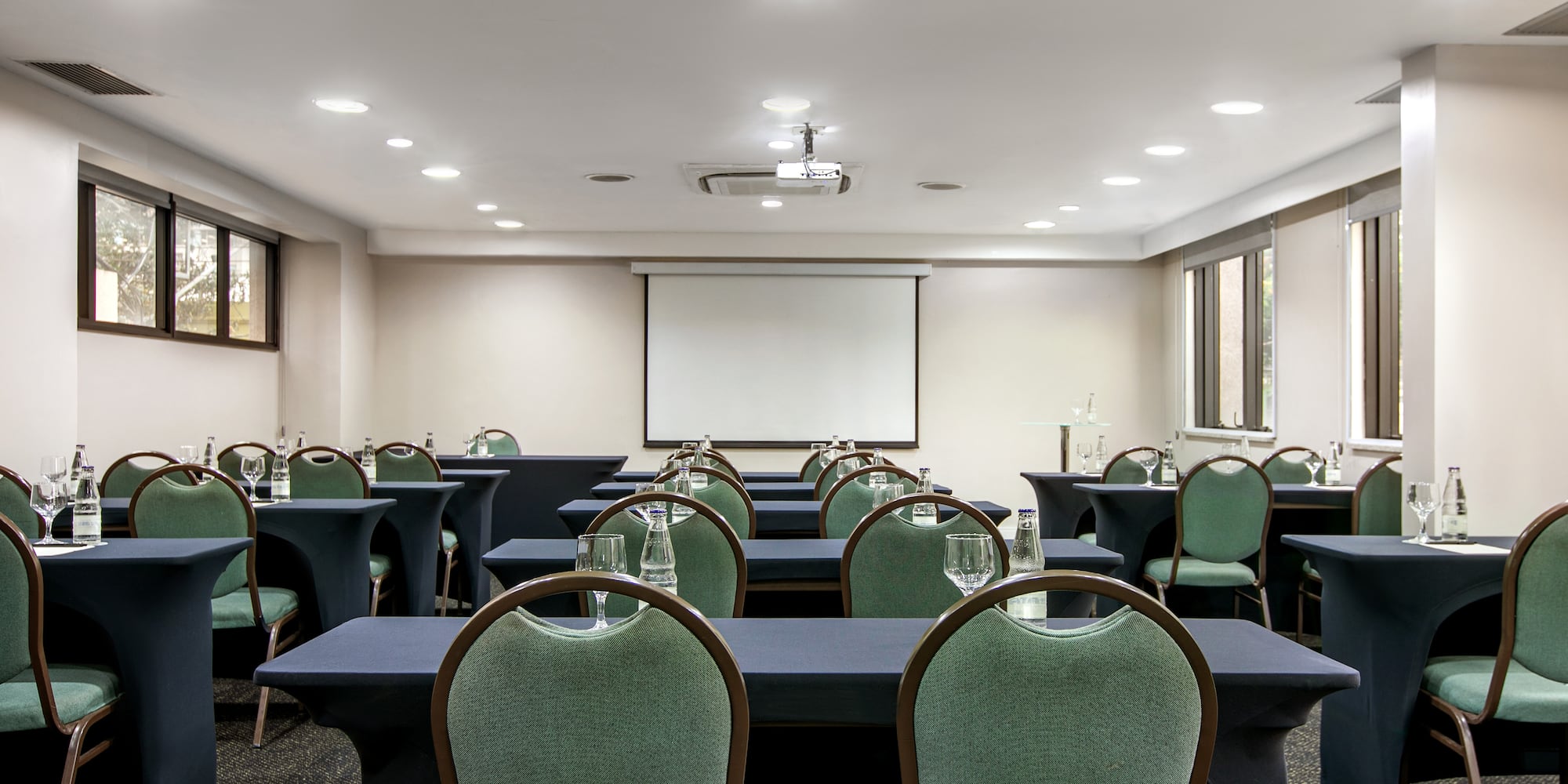 a room with tables and chairs
