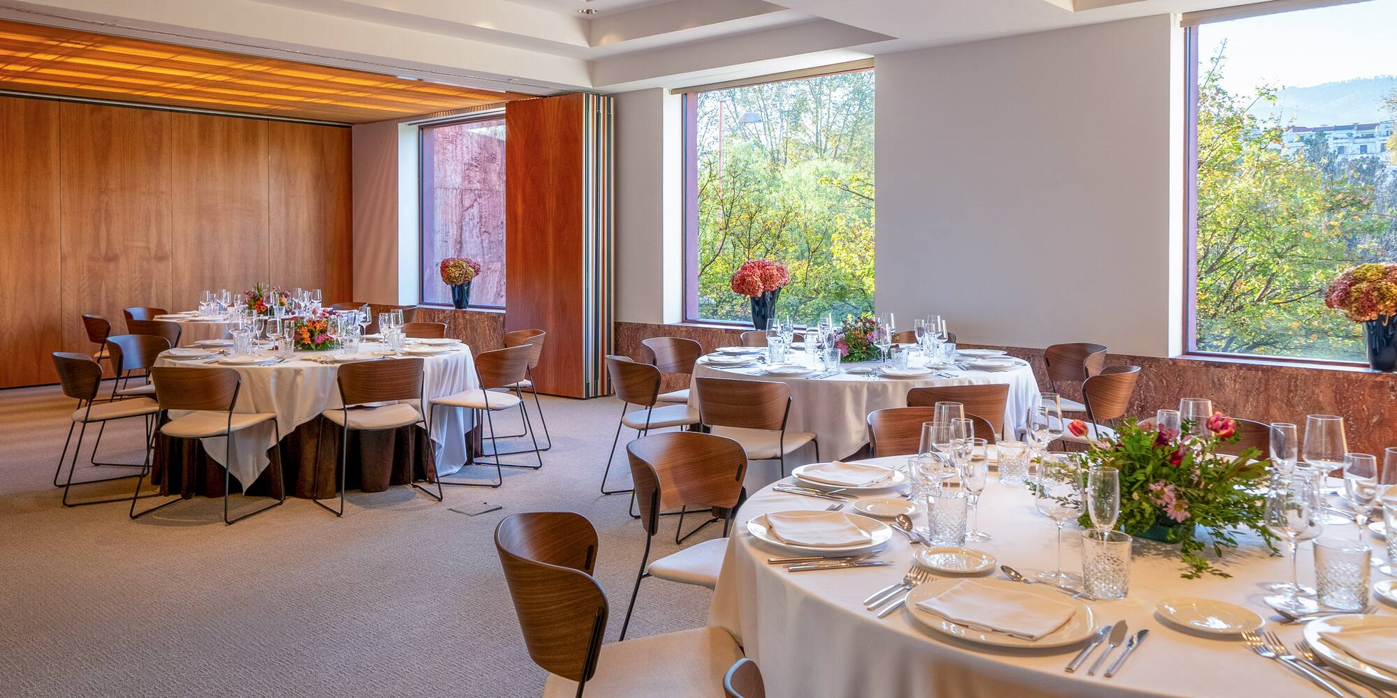 a room with tables and chairs