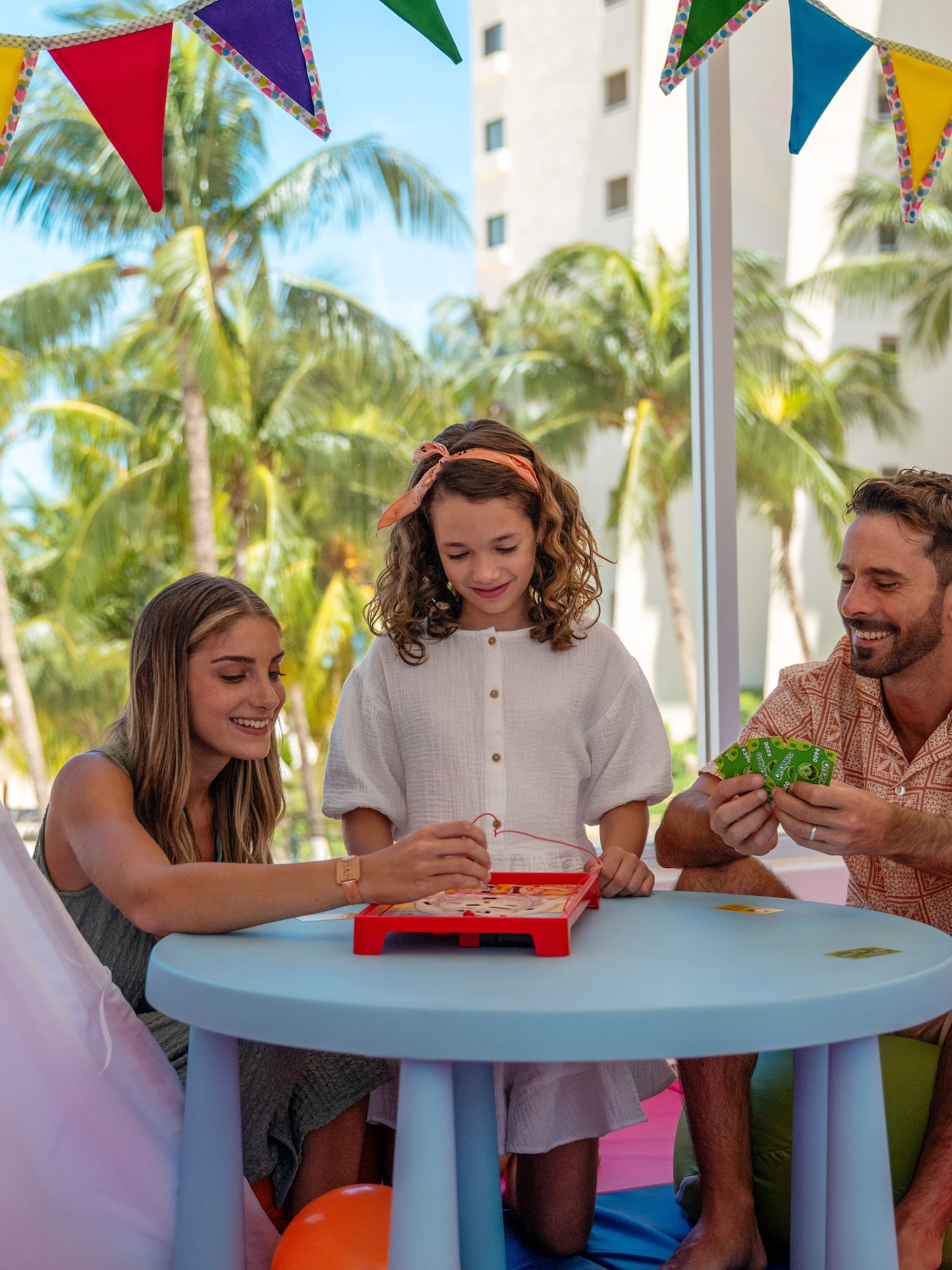 a group of people playing a board game