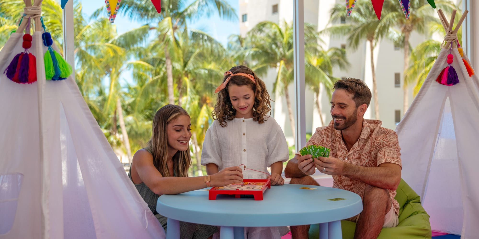 a group of people playing a board game