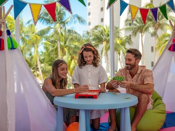 a group of people playing a board game