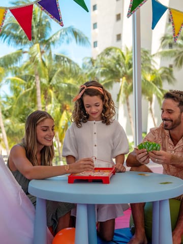 a group of people playing a board game