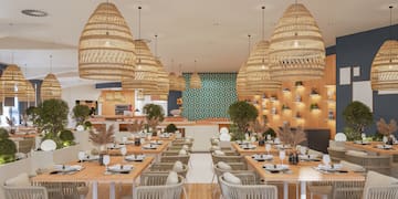a restaurant with tables and chairs
