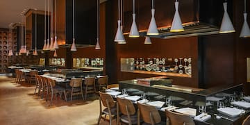 a restaurant with chairs and tables